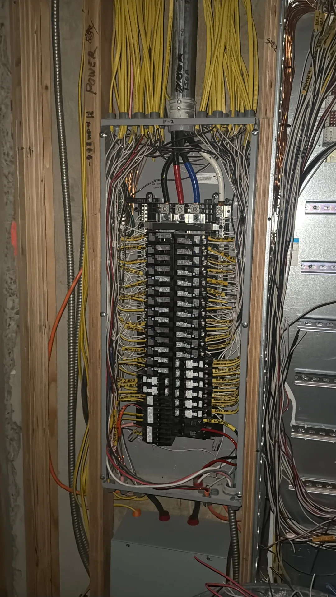 Code-compliant electrical panel after Berman Electric rewire — labeled circuits, organized conductors, Suffolk County NY