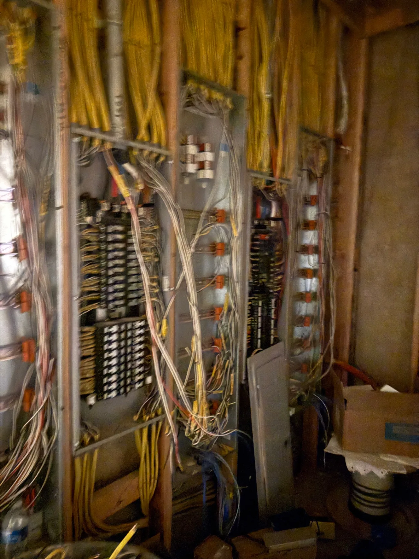 Tangled, hazardous electrical wiring before Berman Electric panel rewire on Long Island NY